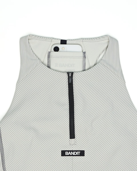 Bandit Running: Women's Striped Cadence™ Zip Front Race Crop - Plaster/Slate